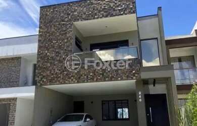 Imagem: A casa em condomínio possui 3 Dormitórios, 2 Banheiros, 2