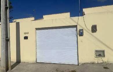 Imagem: A casa possui 2 Dormitórios, 1 Banheiro, 1 Vaga na garagem