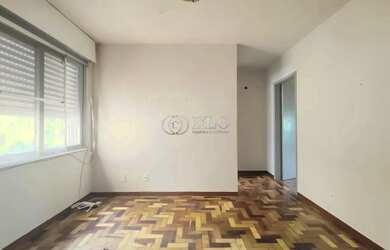 Imagem: O apartamento possui 1 Dormitório, 1 Banheiro, 1 Vaga na garagem