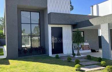 Imagem: A casa em condomínio possui 3 Dormitórios, 4 Banheiros, 2