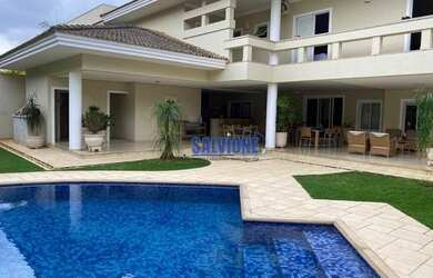 Imagem: A casa em condomínio possui 5 Dormitórios, 5 Banheiros, 5