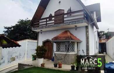 Imagem: A casa possui 3 Dormitórios, 4 Banheiros, 3 Vagas na garagem