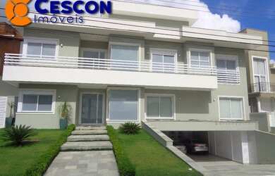 Imagem: A casa em condomínio possui 4 Dormitórios, 5 Banheiros, 5