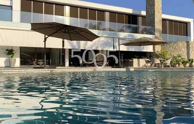 Imagem: A casa em condomínio possui 5 Dormitórios, 5 Banheiros, 4