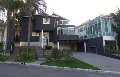 Imagem: A casa em condomínio possui 4 Dormitórios, 5 Banheiros, 4