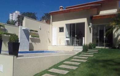 Imagem: A casa possui 2 Dormitórios, 2 Banheiros, 3 Vagas na garagem