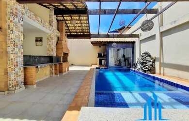 Imagem: A casa possui 5 Dormitórios, 5 Banheiros, 5 Vagas na garagem