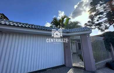 Imagem: A casa possui 4 Dormitórios, 1 Banheiro, 3 Vagas na garagem