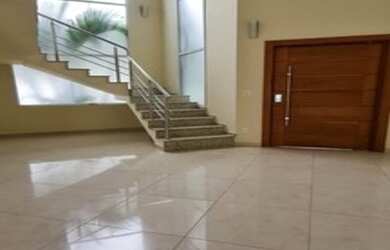 Imagem: A casa em condomínio possui 4 Dormitórios, 5 Banheiros, 4