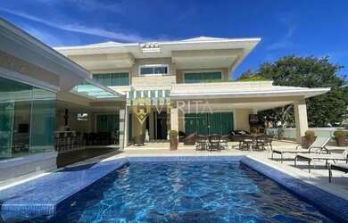 Imagem: A casa em condomínio à venda possui 5 Dormitórios, 5 Banheiros