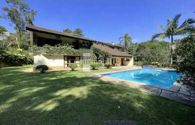 Imagem: A casa possui 5 Dormitórios, 5 Banheiros, 5 Vagas na garagem