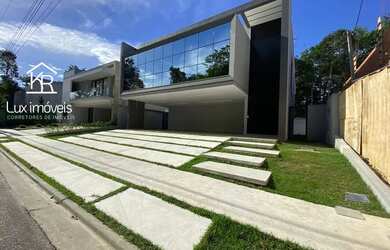 Imagem: A casa em condomínio possui 4 Dormitórios, 5 Banheiros, 4