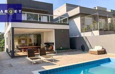 Imagem: A casa em condomínio possui 3 Dormitórios, 4 Banheiros, 5