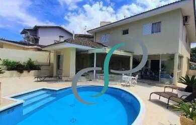 Imagem: A casa em condomínio possui 4 Dormitórios, 5 Banheiros, 4