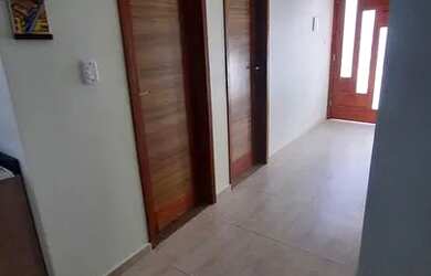 Imagem: A casa possui 2 Dormitórios, Acomodam 10 pessoas, 1 Vaga na