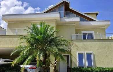 Imagem: A casa em condomínio possui 4 Dormitórios, 5 Banheiros, 4