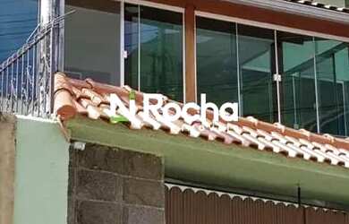 Imagem: A casa possui 3 Dormitórios, 3 Banheiros, 5 Vagas na garagem