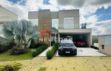 Imagem: A casa em condomínio possui 4 Dormitórios, 5 Banheiros, 4