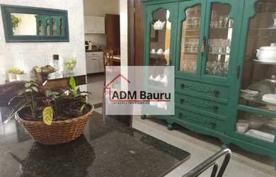 Imagem: A casa possui 4 Dormitórios, 2 Banheiros, 3 Vagas na garagem