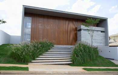 Imagem: A casa em condomínio possui 4 Dormitórios, 5 Banheiros, 4