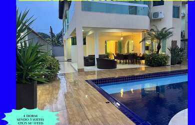 Imagem: A casa possui 4 Dormitórios, 5 Banheiros, 4 Vagas na garagem