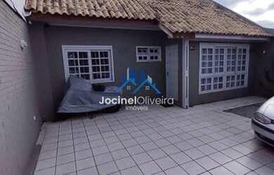 Imagem: A casa possui 3 Dormitórios, 3 Banheiros, 3 Vagas na garagem