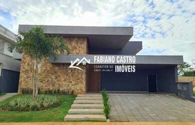 Imagem: A casa em condomínio possui 4 Dormitórios, 5 Banheiros, 2