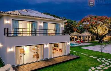 Imagem: A casa possui 4 Dormitórios, 5 Banheiros, 2 Vagas na garagem