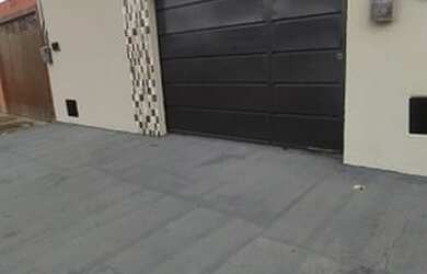 Imagem: A casa possui 2 Dormitórios, 2 Banheiros, 3 Vagas na garagem