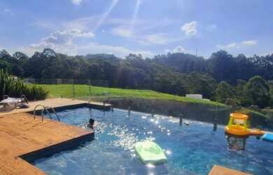 Imagem: A casa em condomínio possui 4 Dormitórios, 5 Banheiros, 5