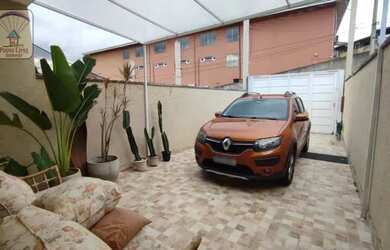 Imagem: A casa possui 2 Dormitórios, 3 Banheiros, 2 Vagas na garagem