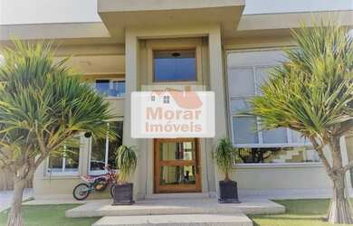 Imagem: A casa em condomínio possui 4 Dormitórios, 5 Banheiros, 5