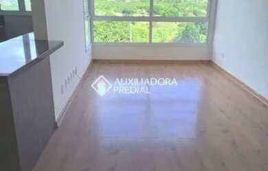 Imagem: O apartamento possui 3 Dormitórios, 1 Banheiro, 1 Vaga na garagem