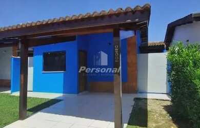 Imagem: A casa possui 2 Dormitórios, 1 Banheiro, 2 Vagas na garagem