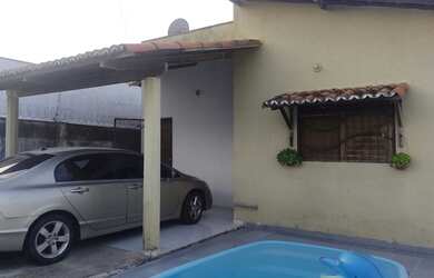 Imagem: A casa possui 2 Dormitórios, 2 Banheiros, 1 Vaga na garagem