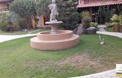 Imagem: A casa em condomínio possui 4 Dormitórios, 4 Banheiros, 2