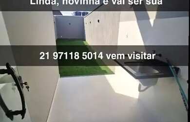 Imagem: A casa possui 2 Dormitórios, 3 Banheiros, 2 Vagas na garagem