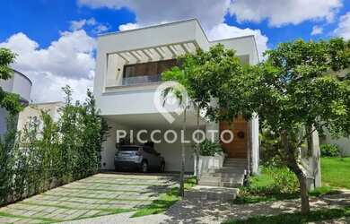 Imagem: A casa em condomínio possui 4 Dormitórios, 5 Banheiros, 4