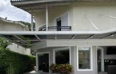 Imagem: A casa em condomínio possui 4 Dormitórios, 5 Banheiros, 4