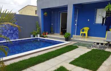 Imagem: A casa possui 2 Dormitórios, 2 Banheiros, 1 Vaga na garagem