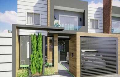 Imagem: A casa possui 3 Dormitórios, 2 Banheiros, 2 Vagas na garagem