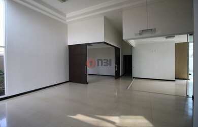 Imagem: A casa possui 3 Dormitórios, 5 Banheiros, 4 Vagas na garagem