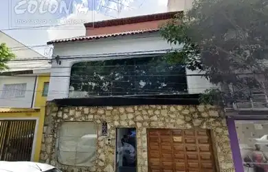 Imagem: A casa possui 3 Dormitórios, 2 Banheiros, 4 Vagas na garagem