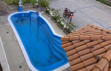 Imagem: A casa em condomínio possui 5 Dormitórios, 5 Banheiros, 3