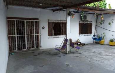 Imagem: A casa possui 3 Dormitórios, 3 Banheiros, 3 Vagas na garagem