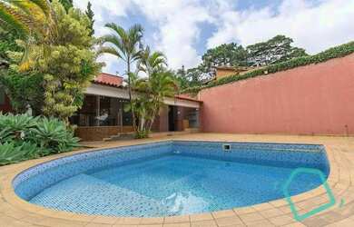 Imagem: A casa em condomínio possui 4 Dormitórios, 5 Banheiros, 5