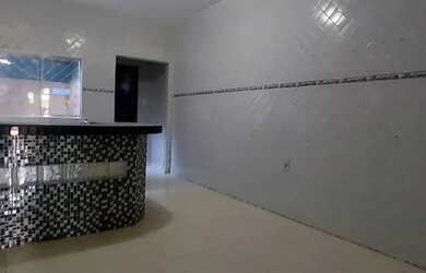 Imagem: A casa possui 2 Dormitórios, 2 Banheiros, 3 Vagas na garagem