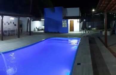 Imagem: A casa possui 5 Dormitórios, 4 Banheiros, 4 Vagas na garagem