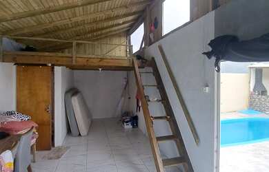 Imagem: A casa possui 2 Dormitórios, 2 Banheiros, 4 Vagas na garagem