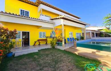 Imagem: A casa possui 5 Dormitórios, 5 Banheiros, 2 Vagas na garagem